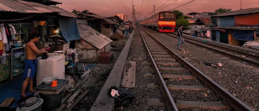 slum along the railroad tracks