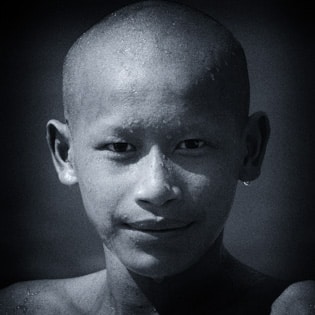 young monk bald Laos